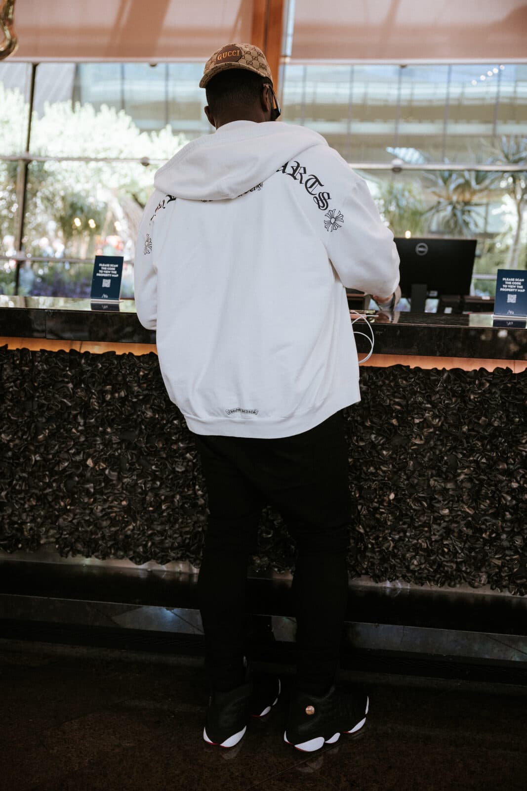 Hotel bar moment, shot from behind