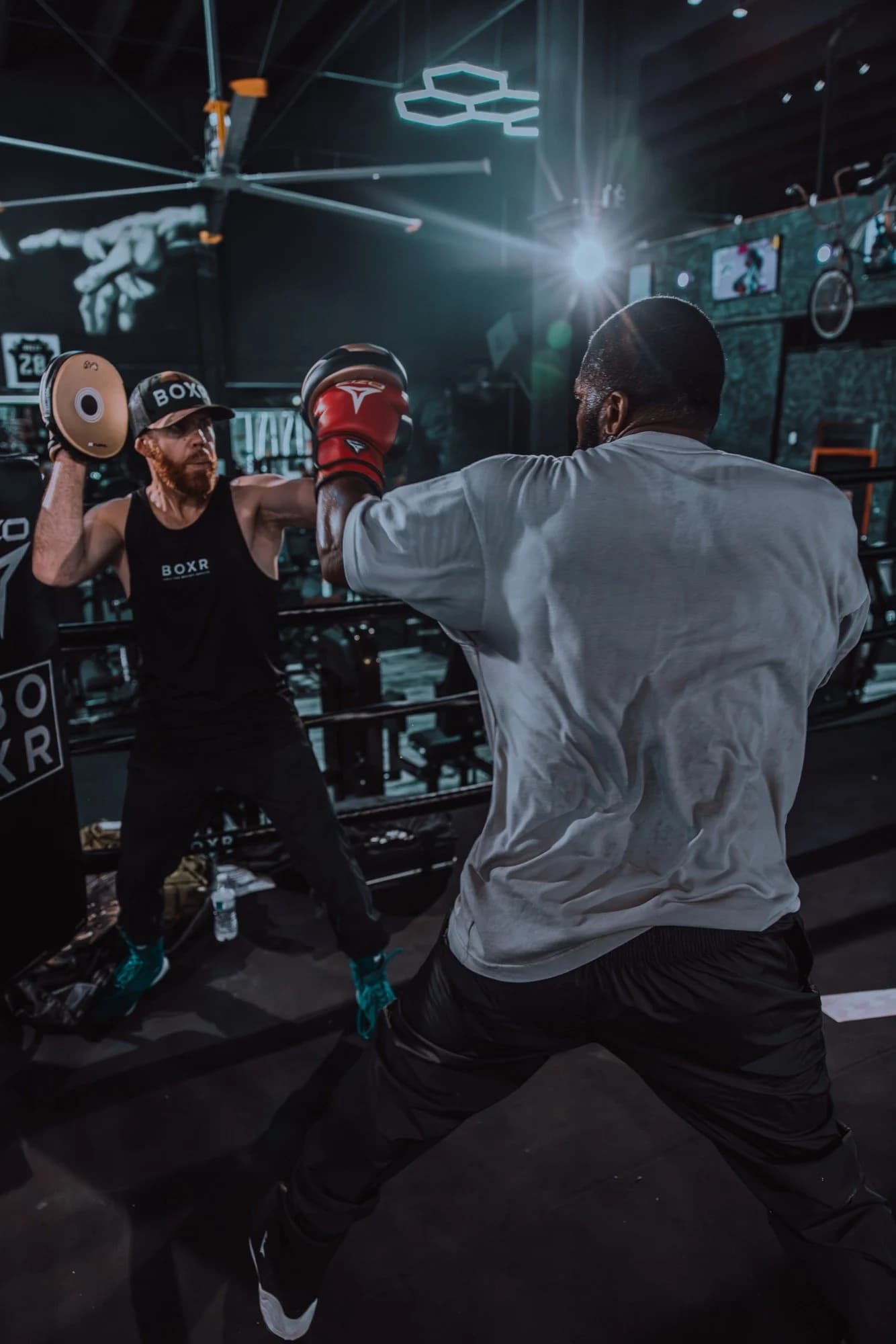 Boxer sparring in gym